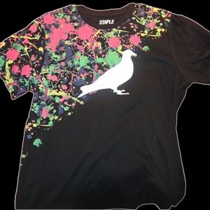 Staple Black Tee with Vibrant Splatter and Pigeon Design